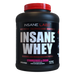 Insane Whey protein powder container with red lid on a white background