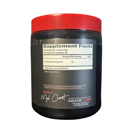 Black supplement container with red lid and visible label on a white background